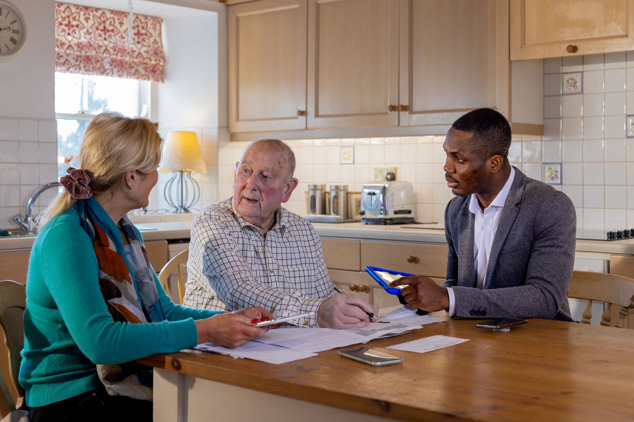 Consultant meeting with clients to discuss business matters